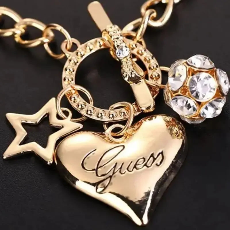 Golden Glam Heart Charm Bracelet
