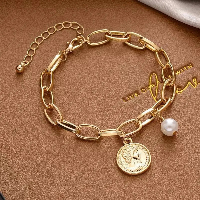 Golden Heart &amp; Pearl Charm Bracelet